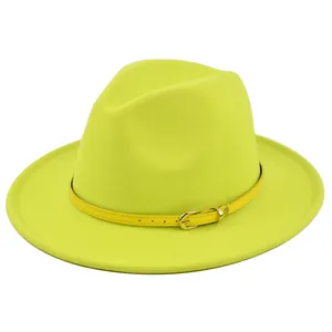 Detailed macro view of the fluorescent yellow fedora featuring a slim buckled band strap
