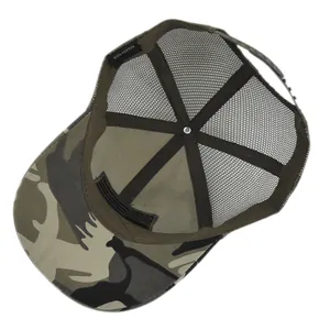 Detail view of the camouflage trucker hat interior with 100% cotton label and mesh back