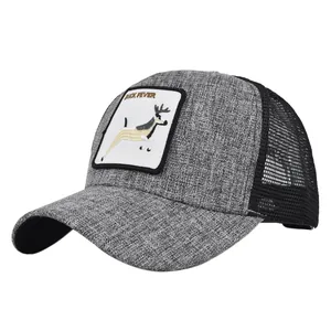 Close-up of Buck Fever deer embroidery patch on grey and black mesh trucker hat