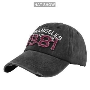 Close-up of vintage Los Angeles 1981 embroidery with distressed details on grey baseball cap