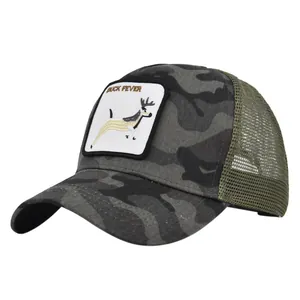 Close-up of camouflage trucker hat featuring detailed buck deer embroidery and mesh