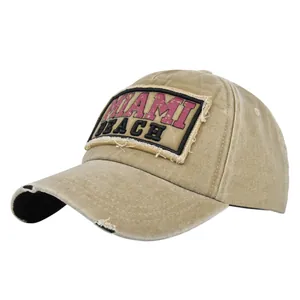 Vintage kaki honkbalpet met Miami Beach borduursel en distressed gescheurde details
