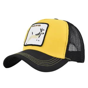 Close-up of yellow trucker hat with black mesh and buck fever animal embroidery patch