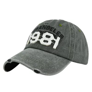 Close-up of distressed brim with 1981 embroidery on washed vintage baseball cap