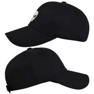 Close-up views of the black baseball cap showing the white alien face embroidery and details