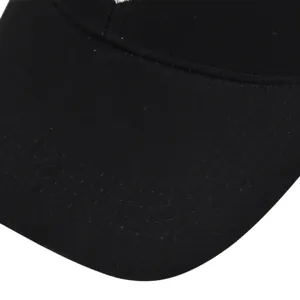 Close-up of the black baseball cap visor with reinforced triple stitching details