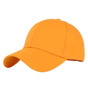 Detailed view of bright orange 6-panel baseball cap with reinforced curved brim and eyelets