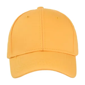 Detail view of bright yellow twill cotton baseball cap with ventilation eyelets and curved brim
