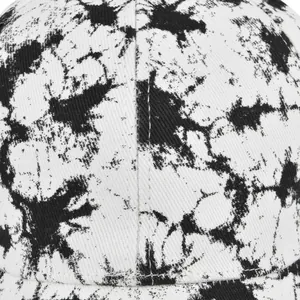 Tie-dye baseball cap with black and white ink splash pattern and twill cotton texture