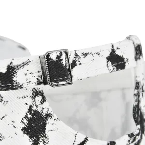 Detail of white tie-dye baseball cap with black graffiti and adjustable metal buckle