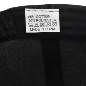 Detail of internal wash care label showing 80% cotton and 20% polyester blend fabric