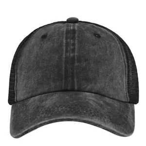 Distressed dark grey ponytail mesh trucker hat for women with adjustable washed canvas texture