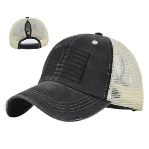 Detail of distressed mesh baseball cap with USA flag patch and functional ponytail hole