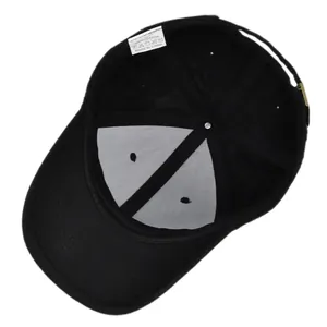 Close-up of internal 100% cotton label and stitching on black baseball cap