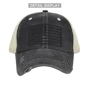 Detailed macro view of distressed American flag embroidery on mesh trucker baseball cap