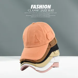 Detailed view of assorted distressed cotton baseball caps in multiple retro colors