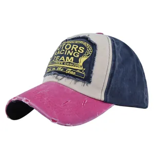 Close-up of distressed vintage MOTORS RACING TEAM baseball cap with retro embroidery