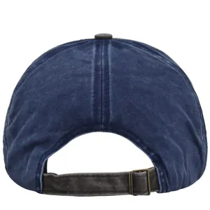 Detail of navy cotton baseball cap back with adjustable metal buckle and fabric strap