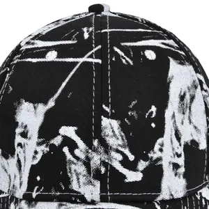 Unisex tie-dye baseball cap featuring black and white abstract graffiti splash print