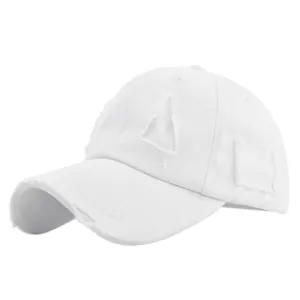 Detailed view of the distressed edges and ripped fabric on a white cotton baseball cap