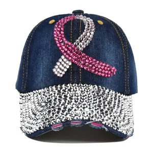 Deep blue denim baseball cap with pink rhinestone ribbon and sparkling diamond brim