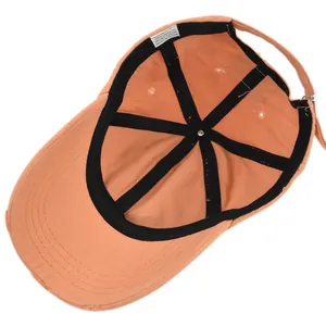 Detail of internal cotton structure, 100% cotton label and black inner sweatband of the cap