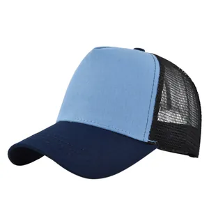 Detail of multi-color breathable mesh trucker hat with navy brim and light blue front panel