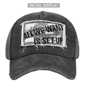 Vintage washed baseball cap with ALL WE WANT IS SET-UP embroidery and distressed details