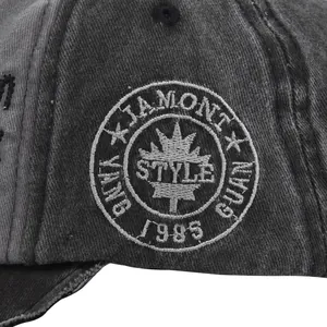Detail of vintage washed baseball cap with embroidered patch and 1985 heritage design