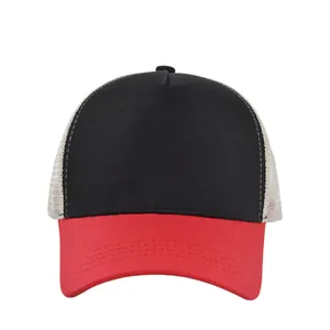 Close-up of a three-color trucker hat showing mesh panels and red visor stitching