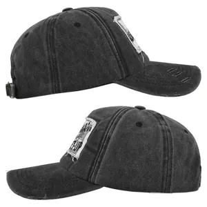 Detail of charcoal grey distressed baseball cap with ripped brim and rectangular patch