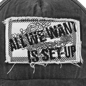 Distressed charcoal gray baseball cap featuring vintage ALL WE WANT IS SET-UP embroidery