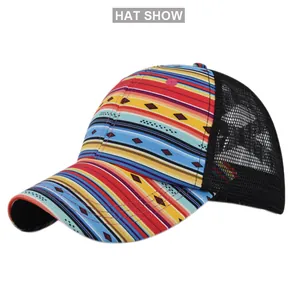 Close-up of colorful ethnic patterns and breathable black mesh on this sporty ponytail cap