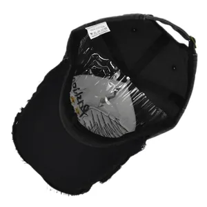 Detail view of 100% cotton washed vintage baseball cap showing inner lining and label