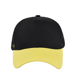 Detail of breathable black mesh and yellow brim on the structured trucker baseball cap