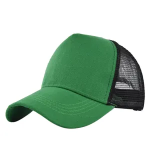 Detail view of grass green trucker hat with breathable black mesh and curved brim