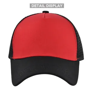 Detailed view of red fabric front and black breathable mesh on a baseball trucker cap