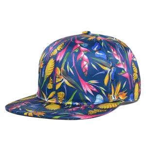Detail of blue satin snapback cap with tropical floral bird and butterfly embroidery