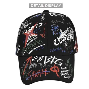 Detailed view of black baseball cap featuring vibrant multi-color street style graffiti patterns