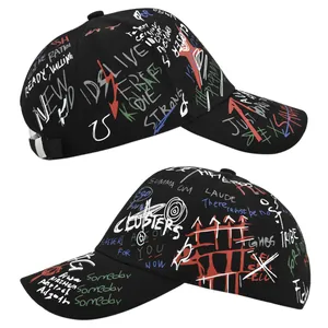 Detail of adjustable metal buckle and street style graffiti pattern on black baseball cap
