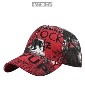 Detailed view of the street style graffiti pattern and Rock lettering on a baseball cap