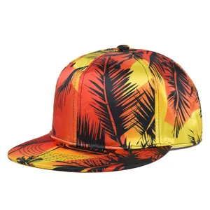 Detail of tropical sunset palm tree silhouette embroidery on a flat brim baseball cap