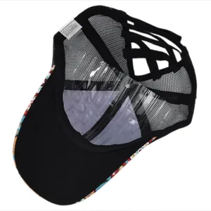 Detail view of the high ponytail opening and inner mesh of the black sun hat