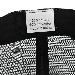 Detail shot of the breathable mesh cap interior showing 50% cotton 50% polyester tag