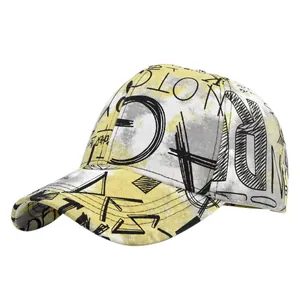 Detailed close-up of yellow and grey graffiti-style baseball cap with high-quality embroidery