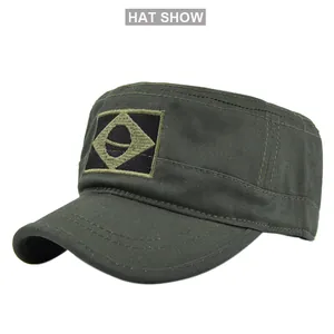 Detail of olive green military patrol cap with rectangular embroidered patch design