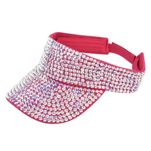 Detail of rose pink sun visor with colorful rhinestones and adjustable velcro strap