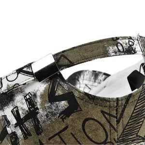 Macro detail of vintage graffiti canvas with metallic buckle and olive green texture