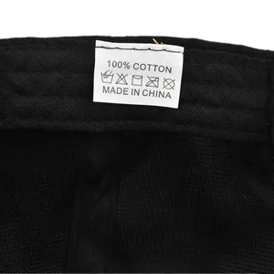 Detail shot of 100% cotton fabric and washing care label inside Route 66 baseball cap