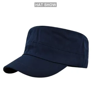 Detail view of reinforced stitching on navy blue cotton twill flat top cadet cap